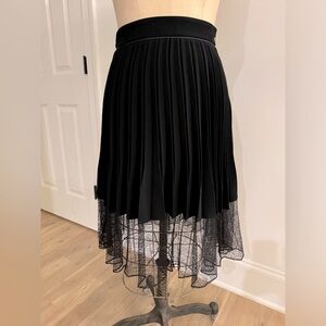 Excellent condition Rag and Bone pleated black skirt with lace detail!  Size 0